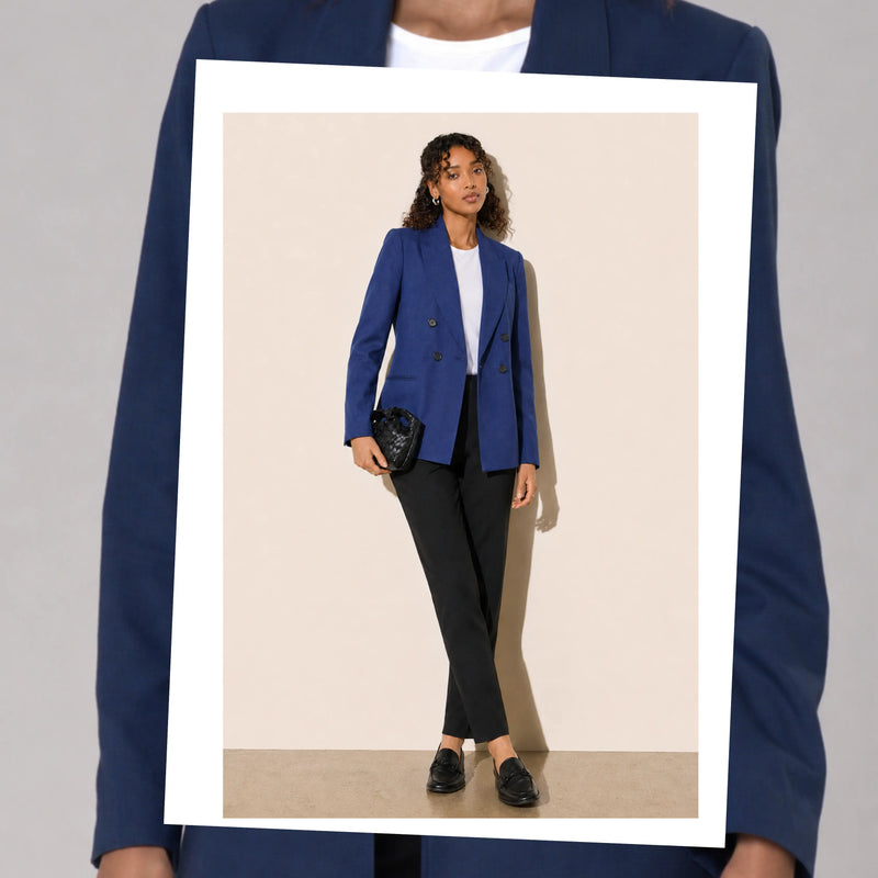 Women's office wear featuring a blue puppytooth blazer and tailored black pants.