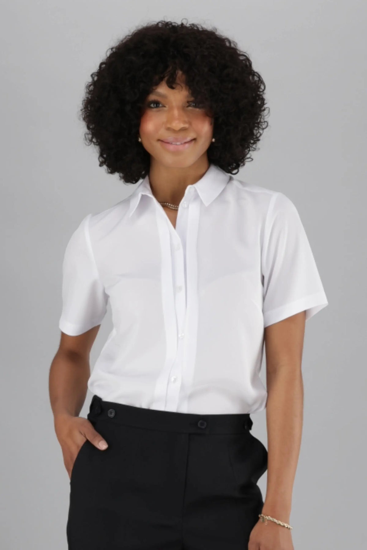 ImNow Women’s Work Shirt with Short Sleeves, a Collared neckline and Pintuck Button Front in White.