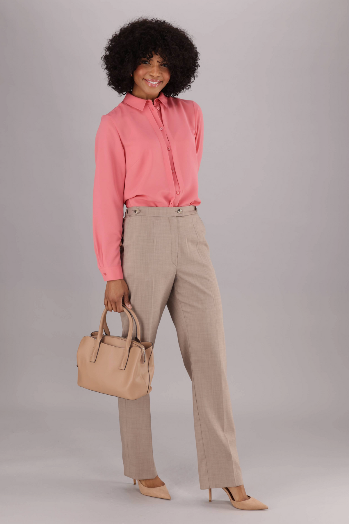Long Sleeve Coral Women’s Blouse from ImNow with Long Sleeve Tabs, Crisp Collar, Pintuck and Front Buttons.