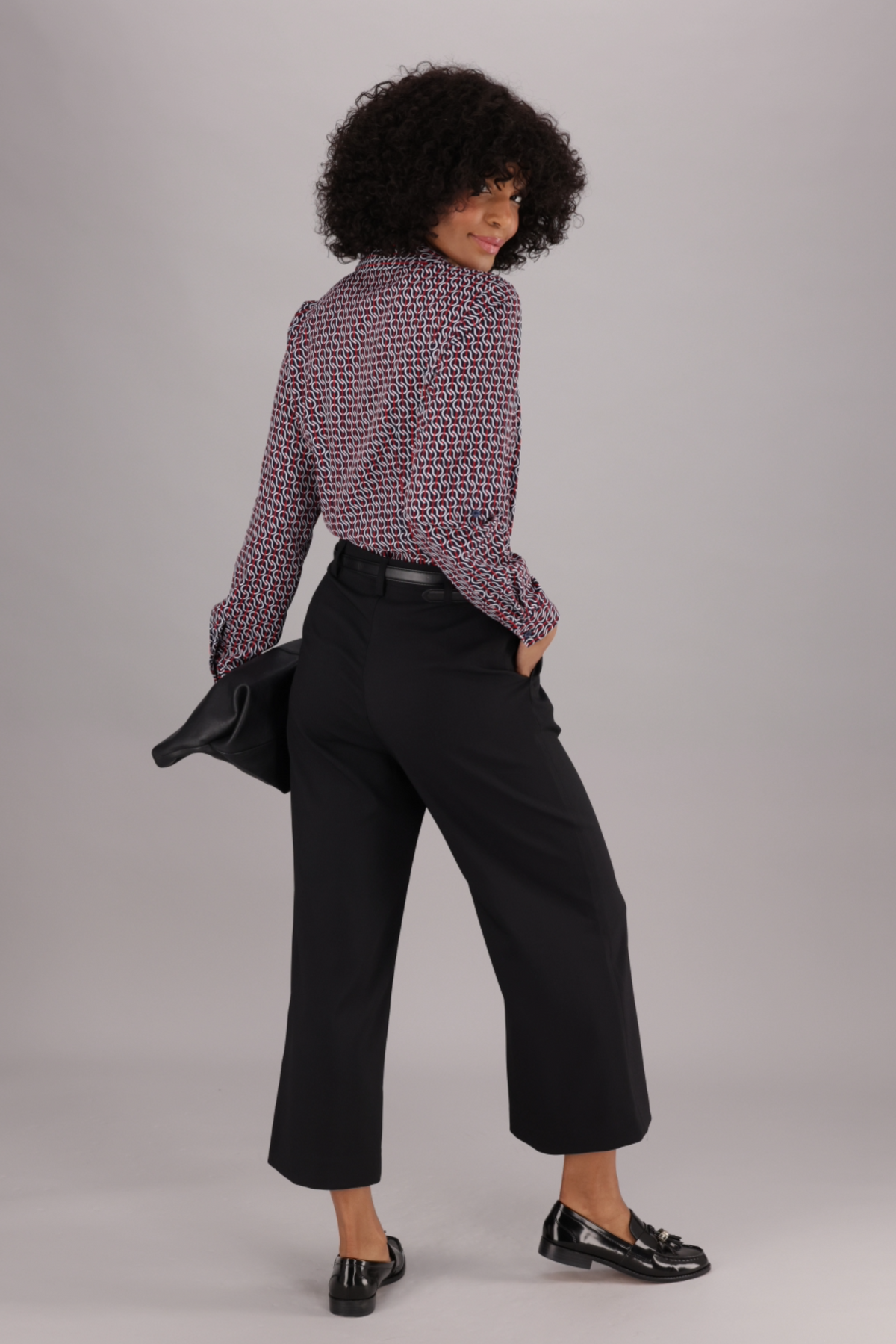 Long-sleeved Women’s Blouse from ImNow in a Navy, Red and White Print, complete with Collar and Pintucks.