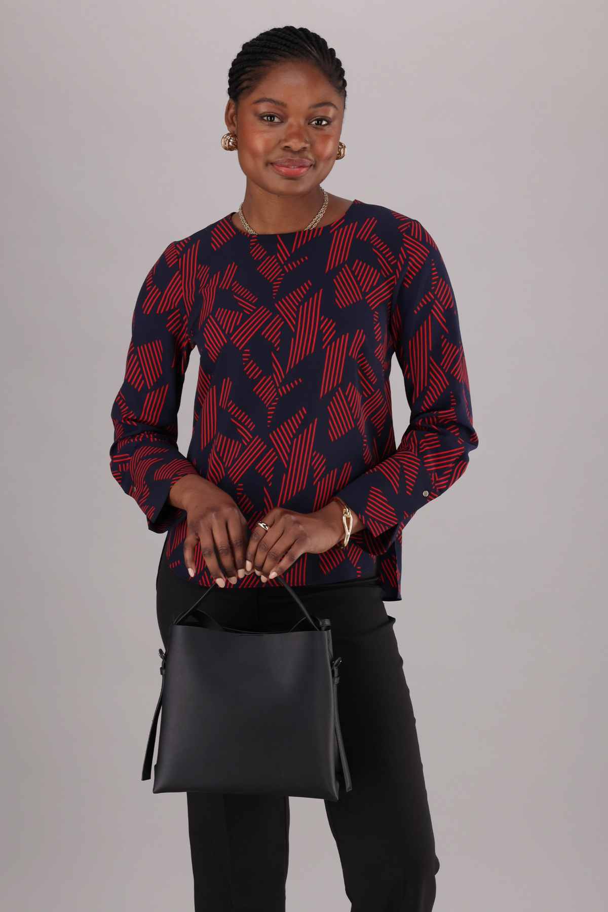 Long sleeve round neck top for women’s officewear in navy and red classic print