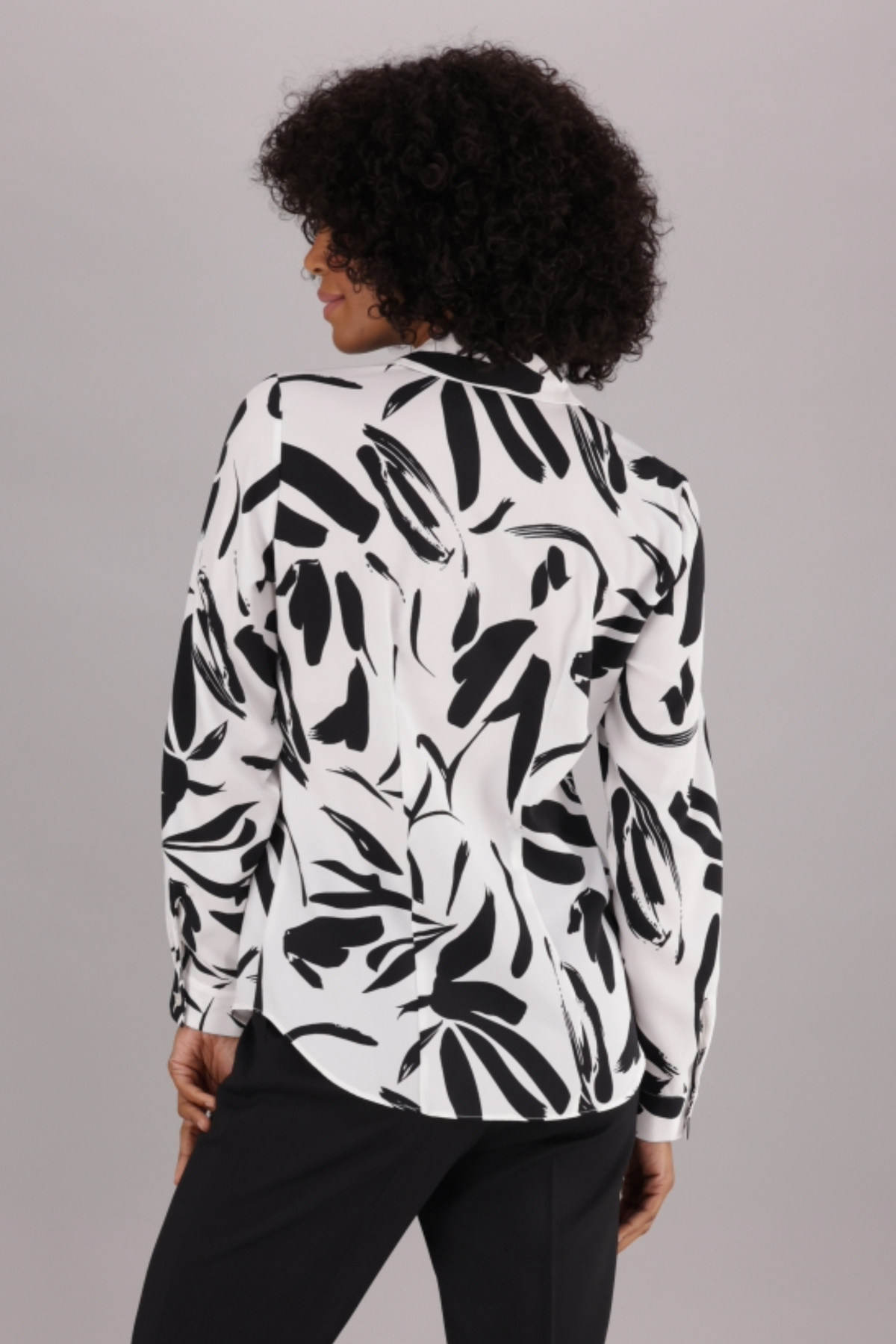 Back View of ImNow Classic Women’s Office Shirt with Long Sleeves and Structured Collar available in White and Black Print.