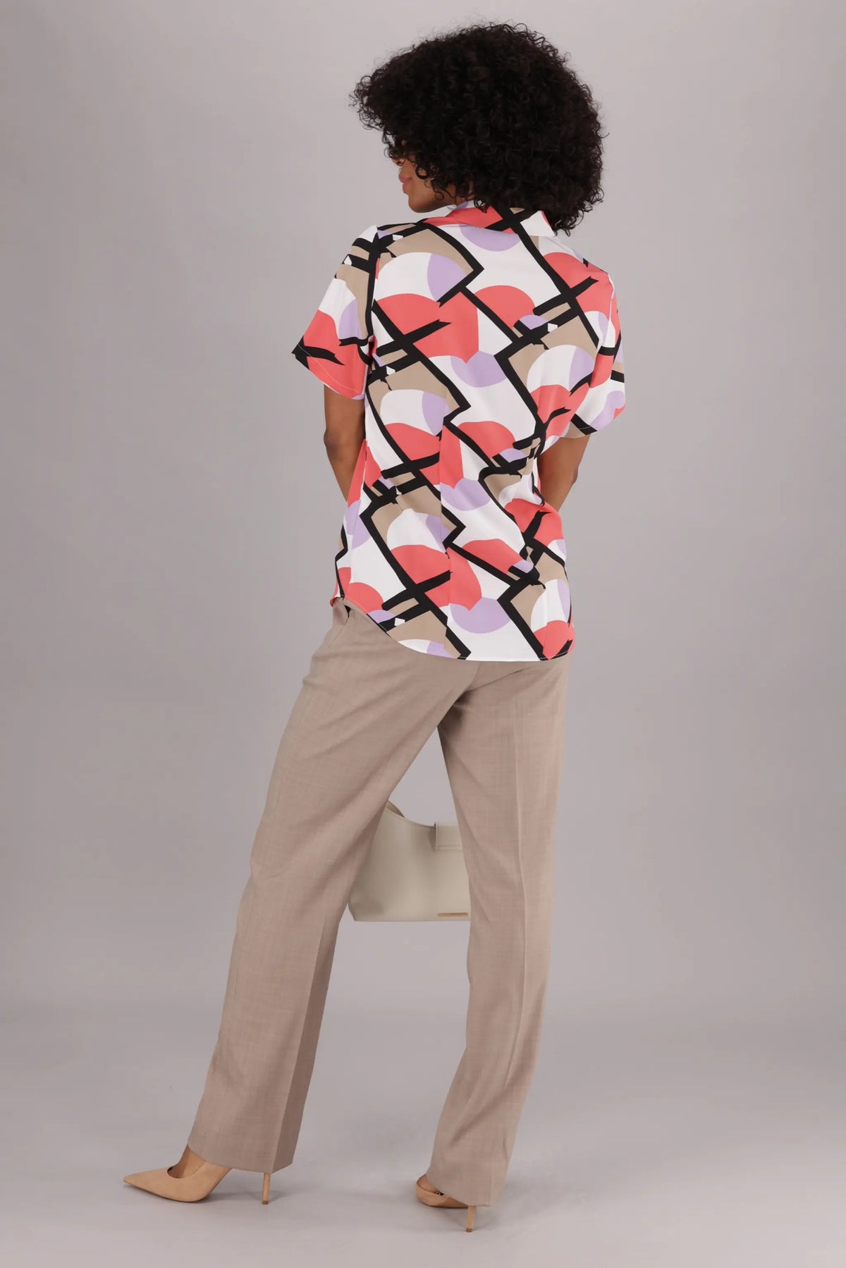Printed Classic Tailored Women’s Shirt from ImNow with Collared Button Front and Pintuck Detail.