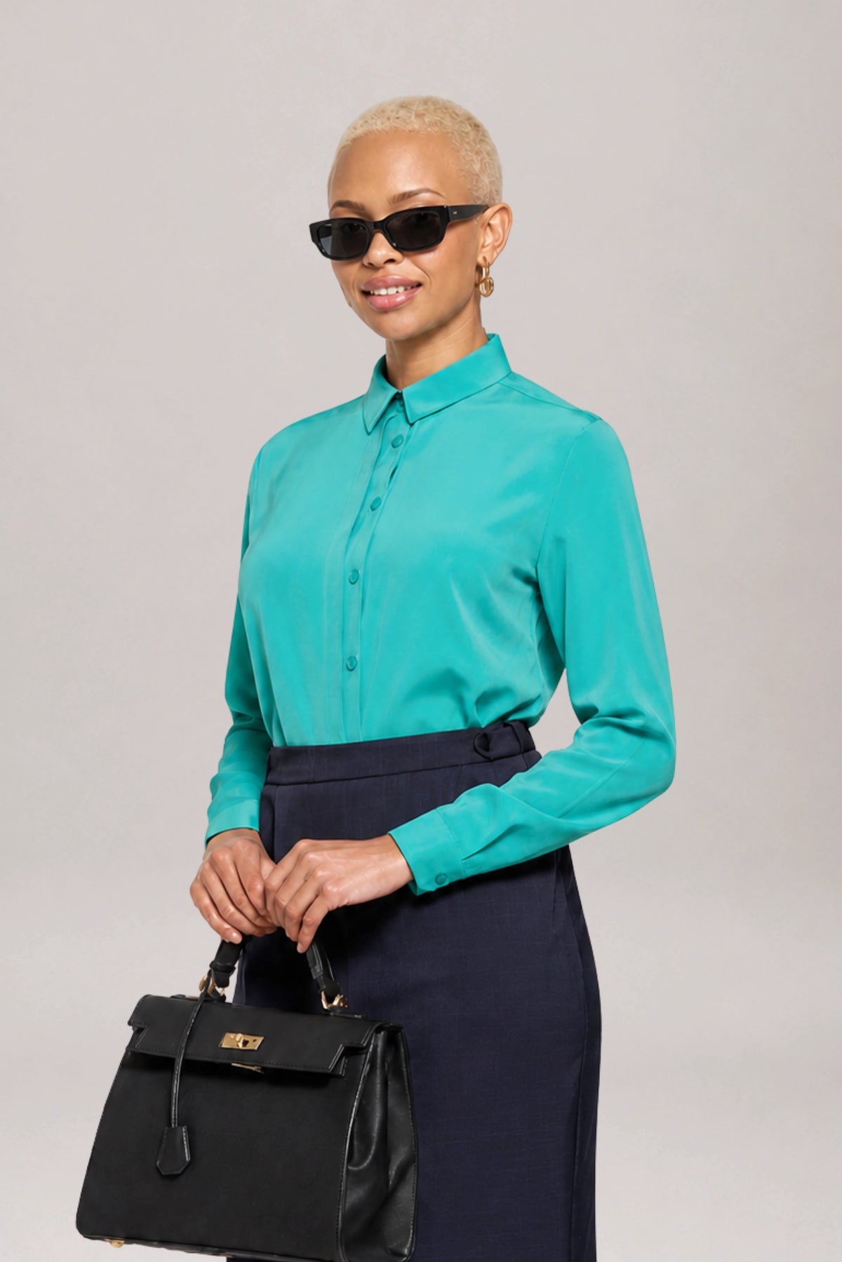Ladies long sleeved, aqua blue smart shirt by ImNow.
