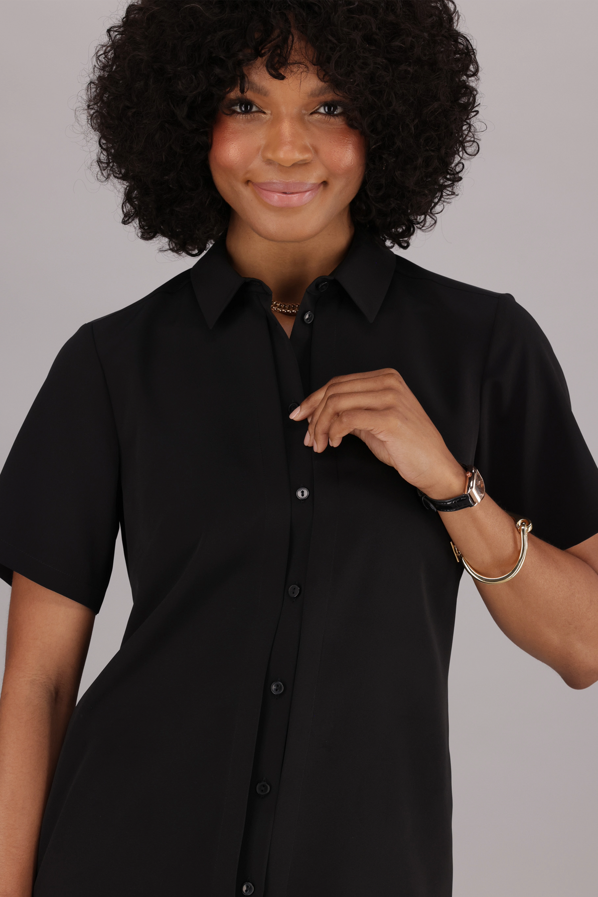 Black Short Sleeve Women’s Work Shirt by ImNow with Buttoned Front and Pintucks. 