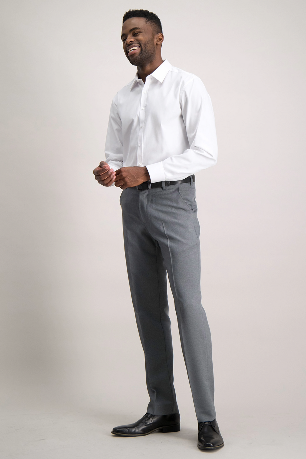 Side view of light grey regular fit trousers by ImNow.
