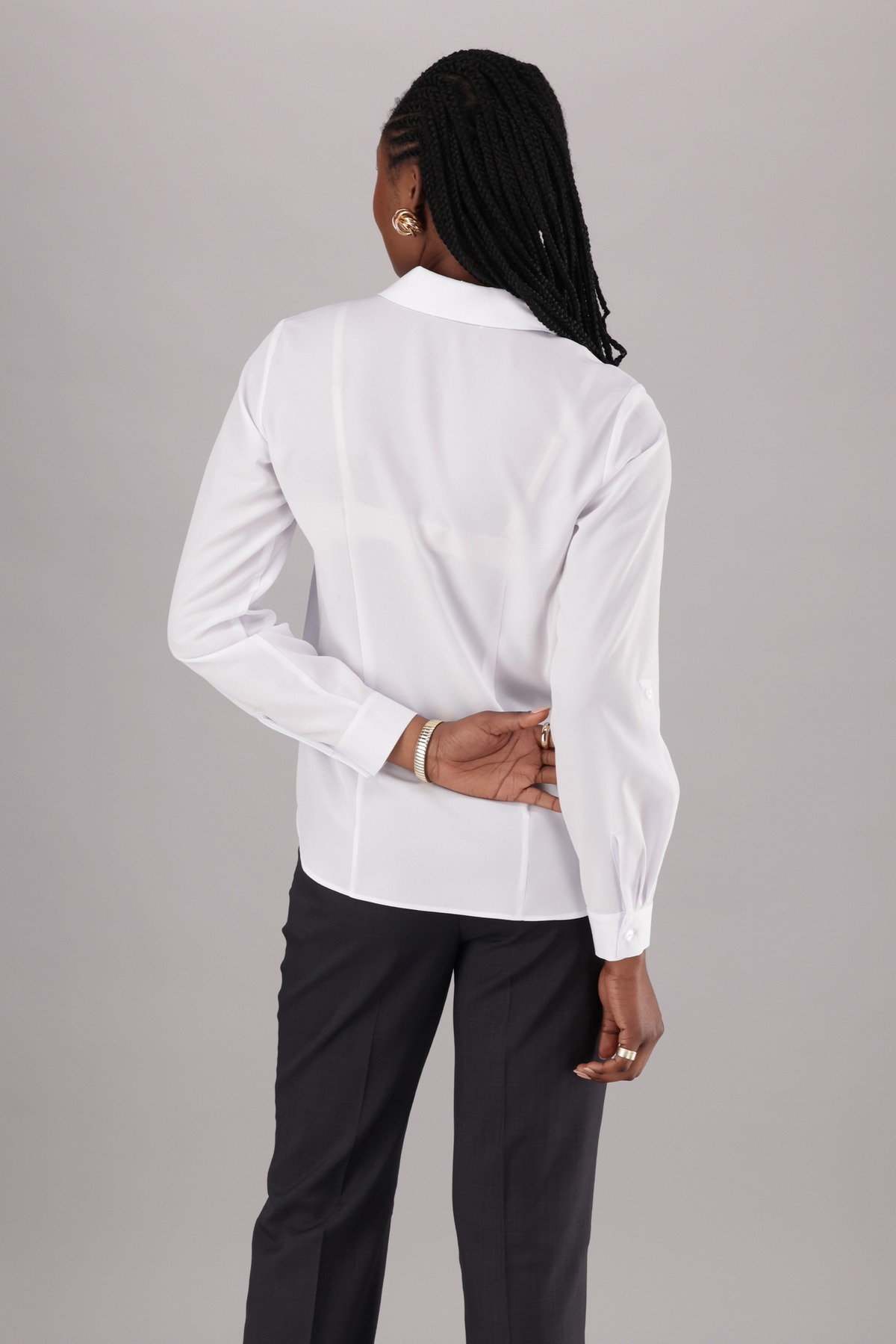 This women’s ImNow blouse delivers structured style with tabbed sleeves a Structured Collar and Back Darts.
