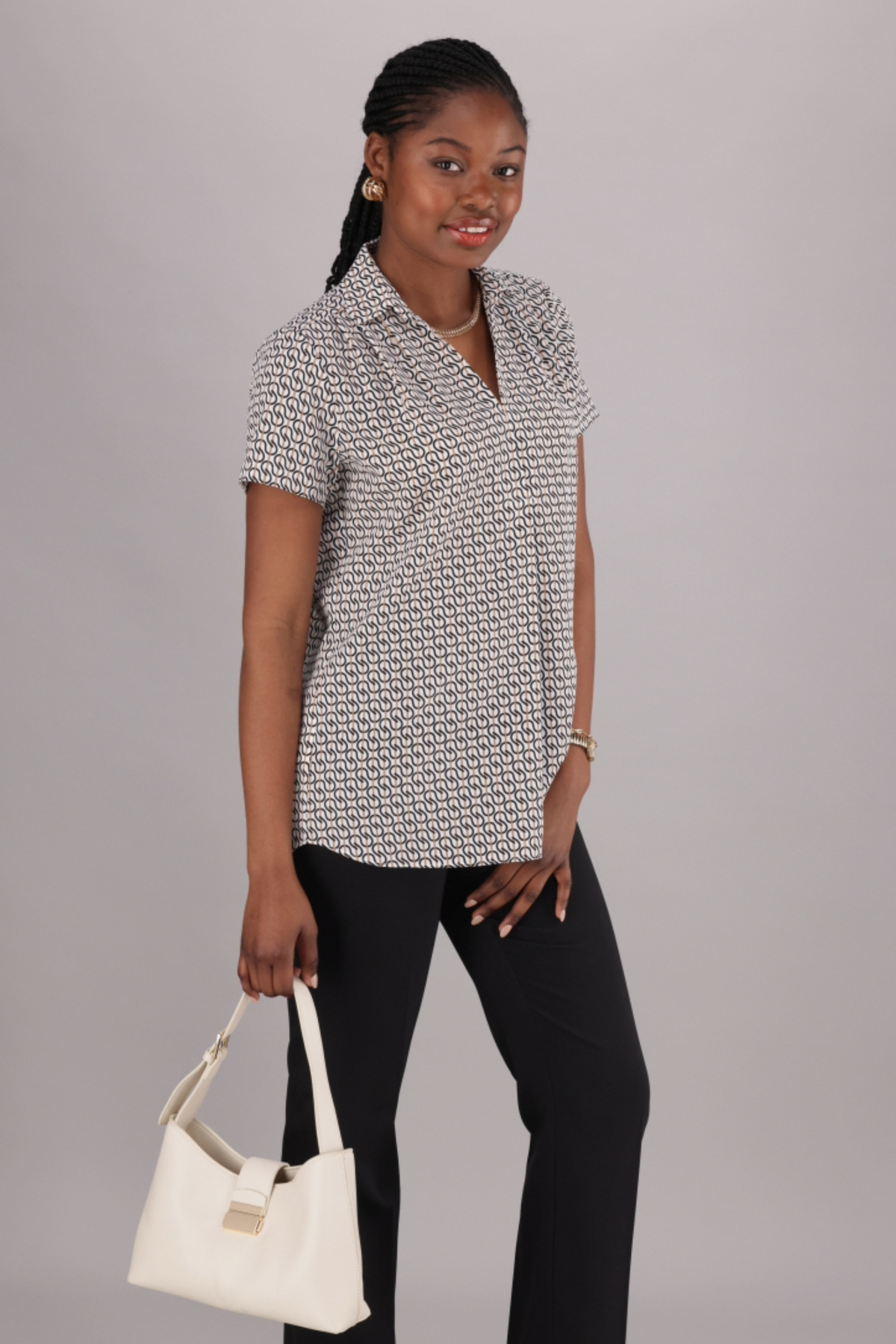 Neutral and Black print Women’s Work Blouse with a V-neckline, Short Sleeves, and a relaxed fit from ImNow.
