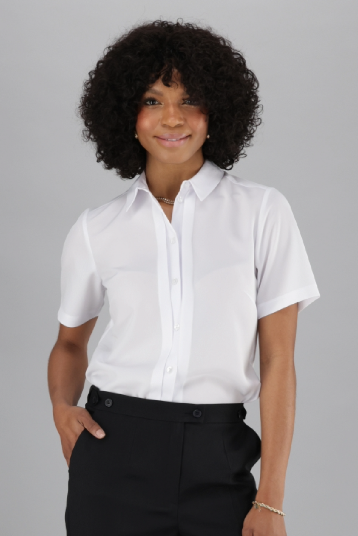 ImNow Women’s Work Shirt with Short Sleeves, a Collared neckline and Pintuck Button Front in White. 
