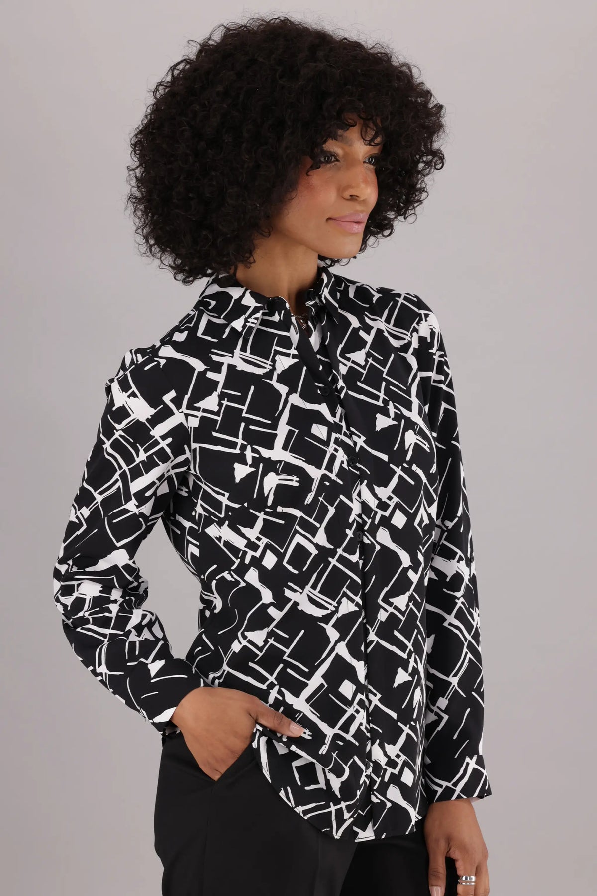 Long Sleeve Women’s Formal Shirt by ImNow featuring a Collar, Pintuck details Button Front in Black and White Print.