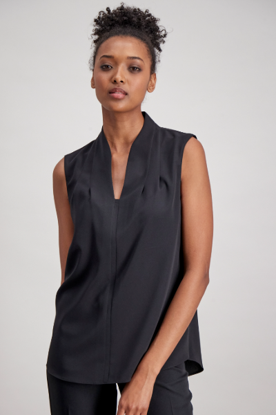 Workwear-friendly sleeveless blouse in black styled for summer