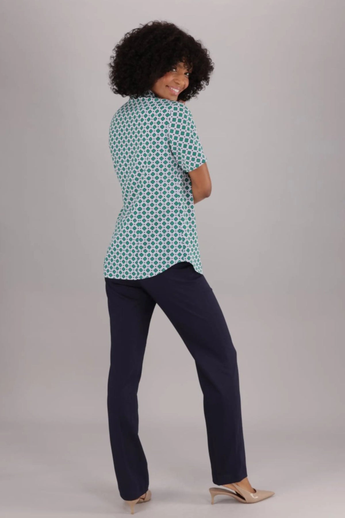 Back View of Women's Short Sleeve Shirt with Back Darts and Collar in a Green Print from ImNow.