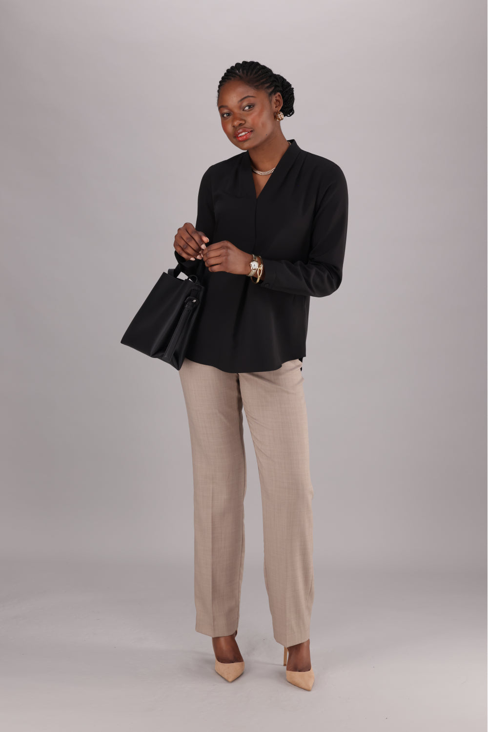 Ladies long sleeve black v-neck blouse by ImNow.