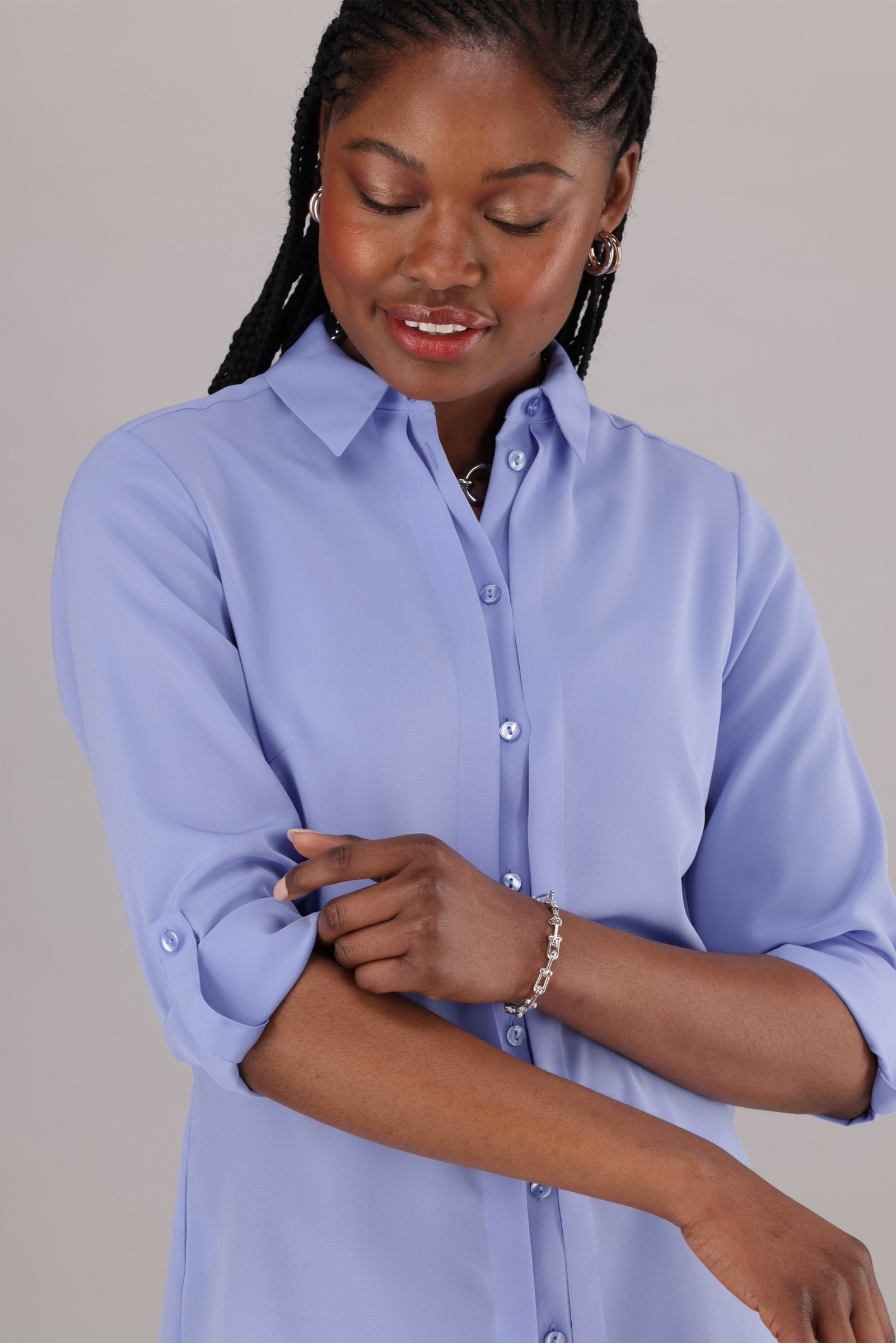 Long Sleeve ImNow Women’s Office Shirt with Classic Collar, Buttons and Pintuck detail in Light Blue. 