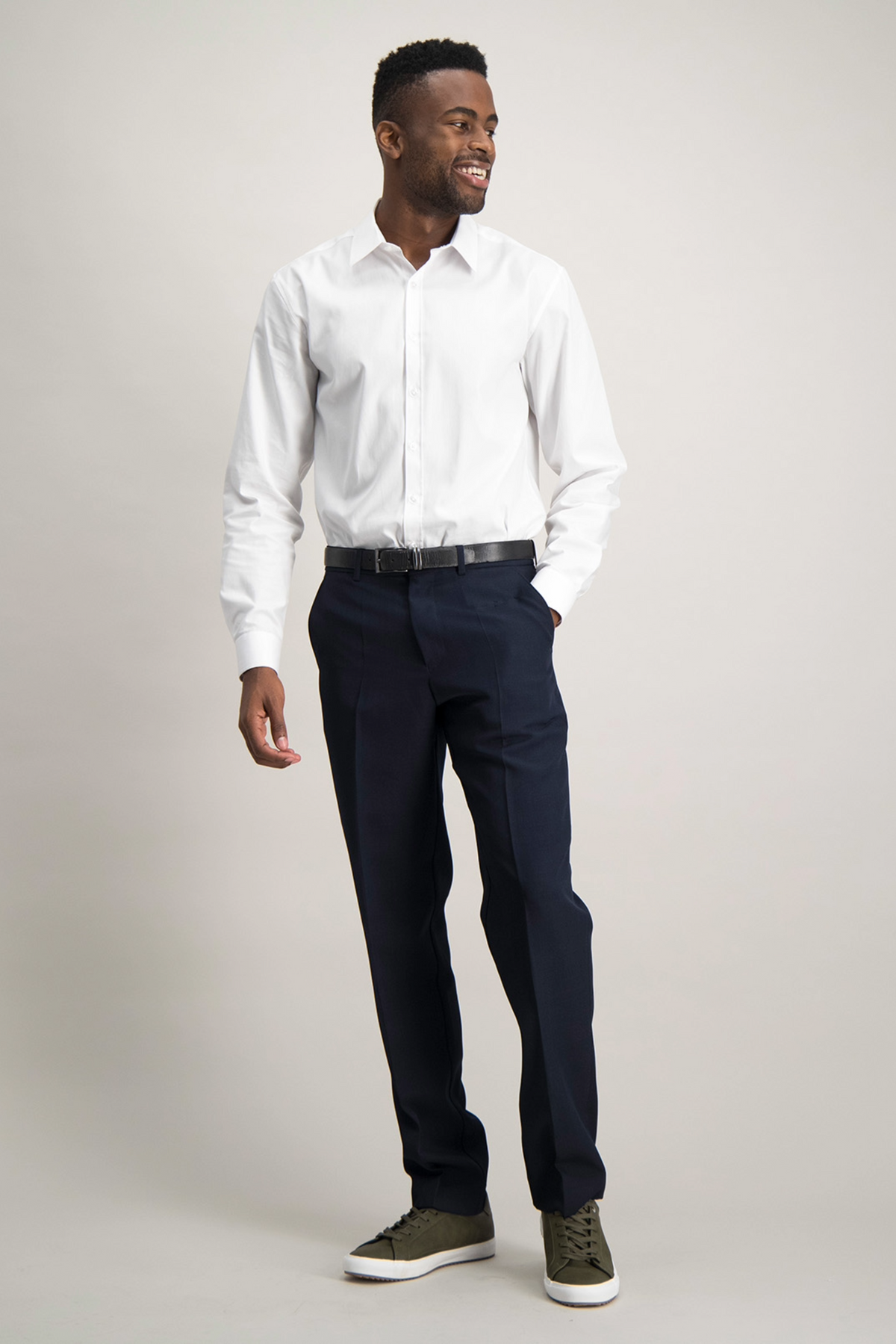 Full front, navy formal work pants paired with a white office shirt for men by ImNow.