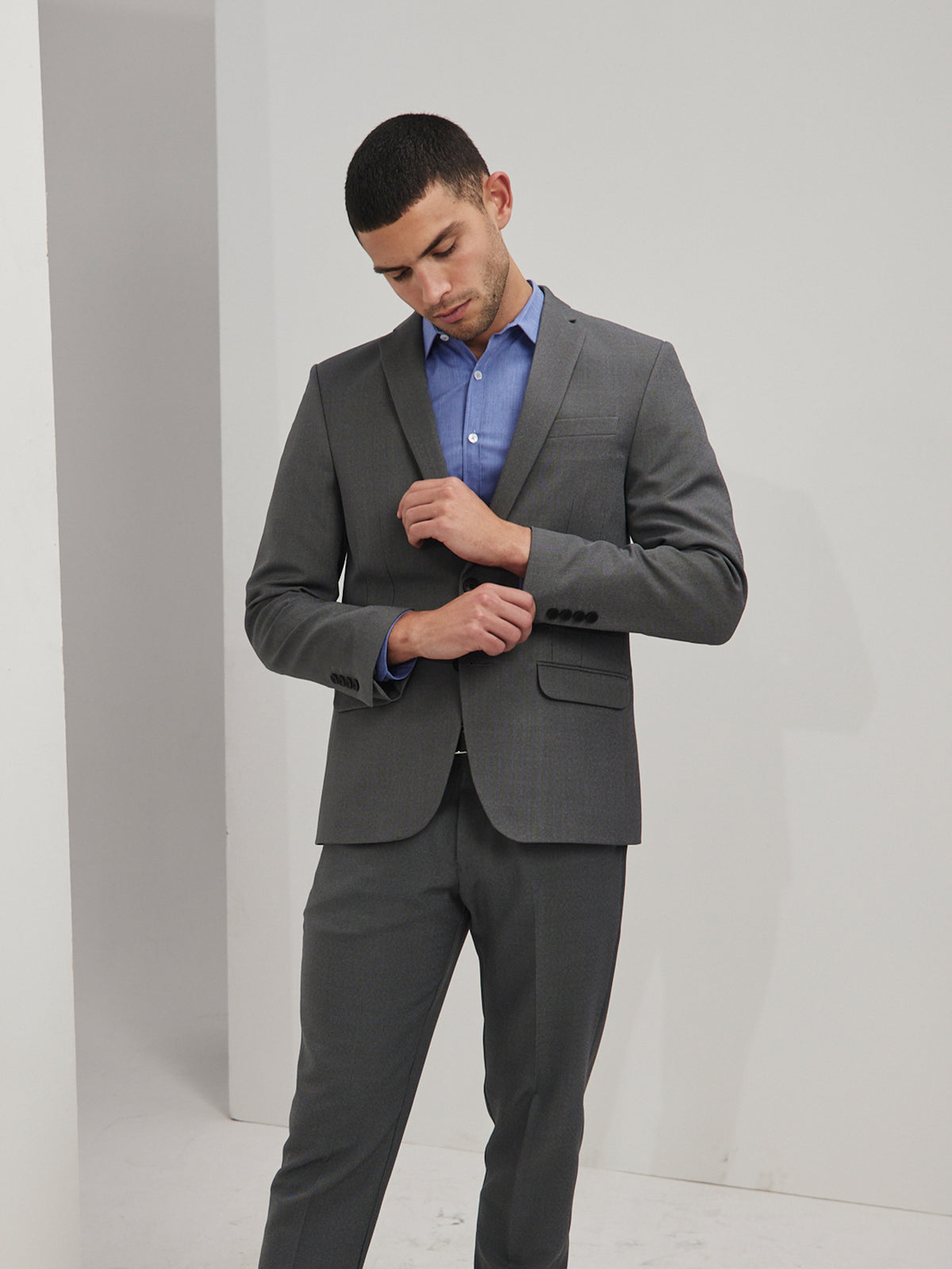 Mens formal grey suit and blue collared shirt by ImNow South Africa.