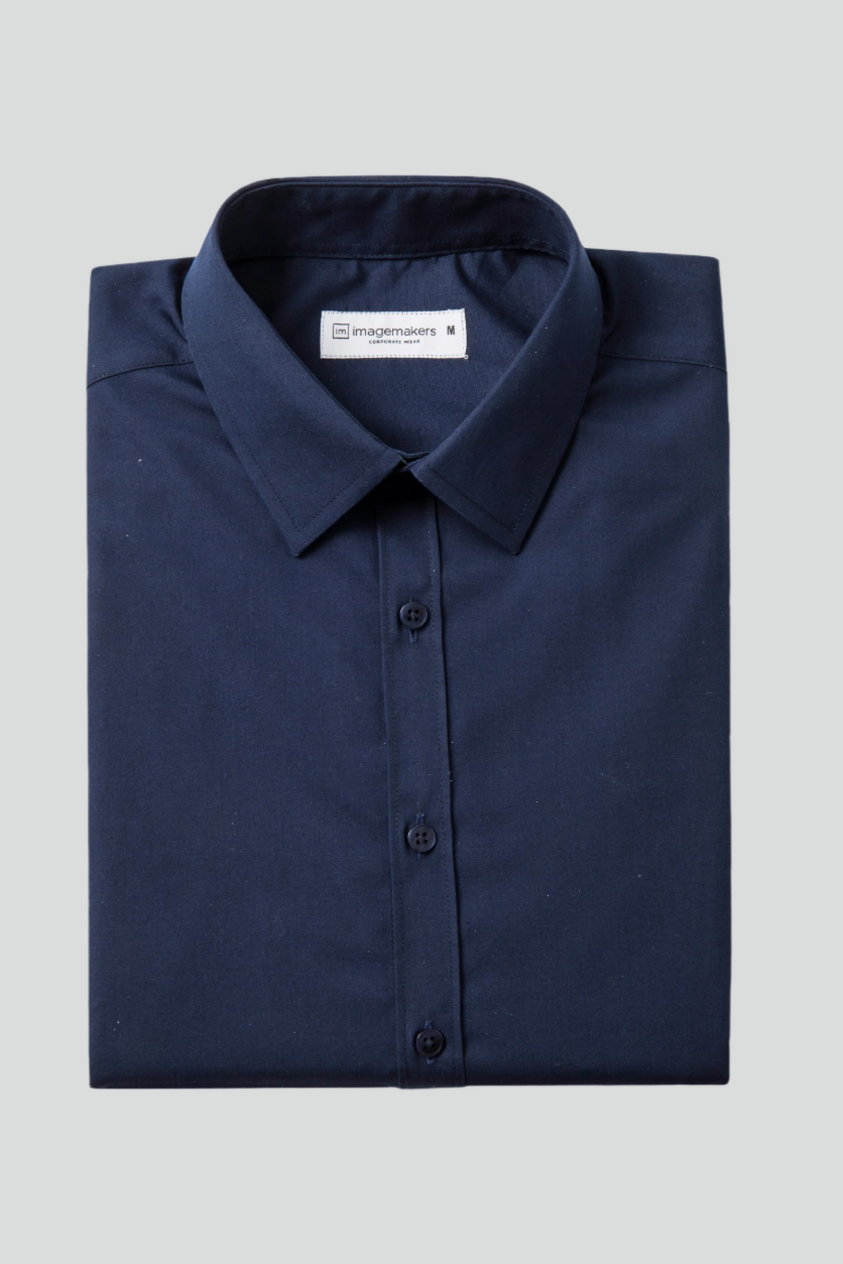 Men's long sleeve formal collared shirt in solid navy by ImNow.