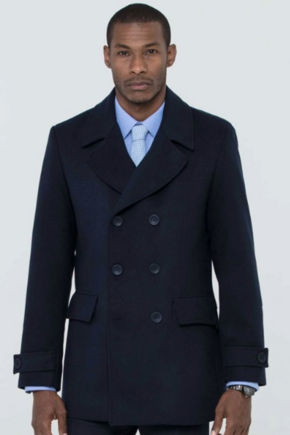 Men’s formal winter coat styled over a suit. Wear it over a slim-fit suit with patent brogues. 