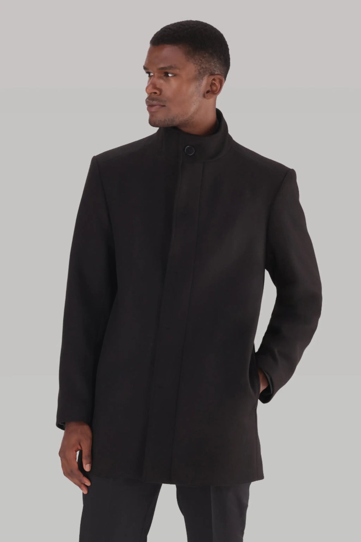 Black winter melton coat for men with funnel neck and concealed stand from  ImNow.