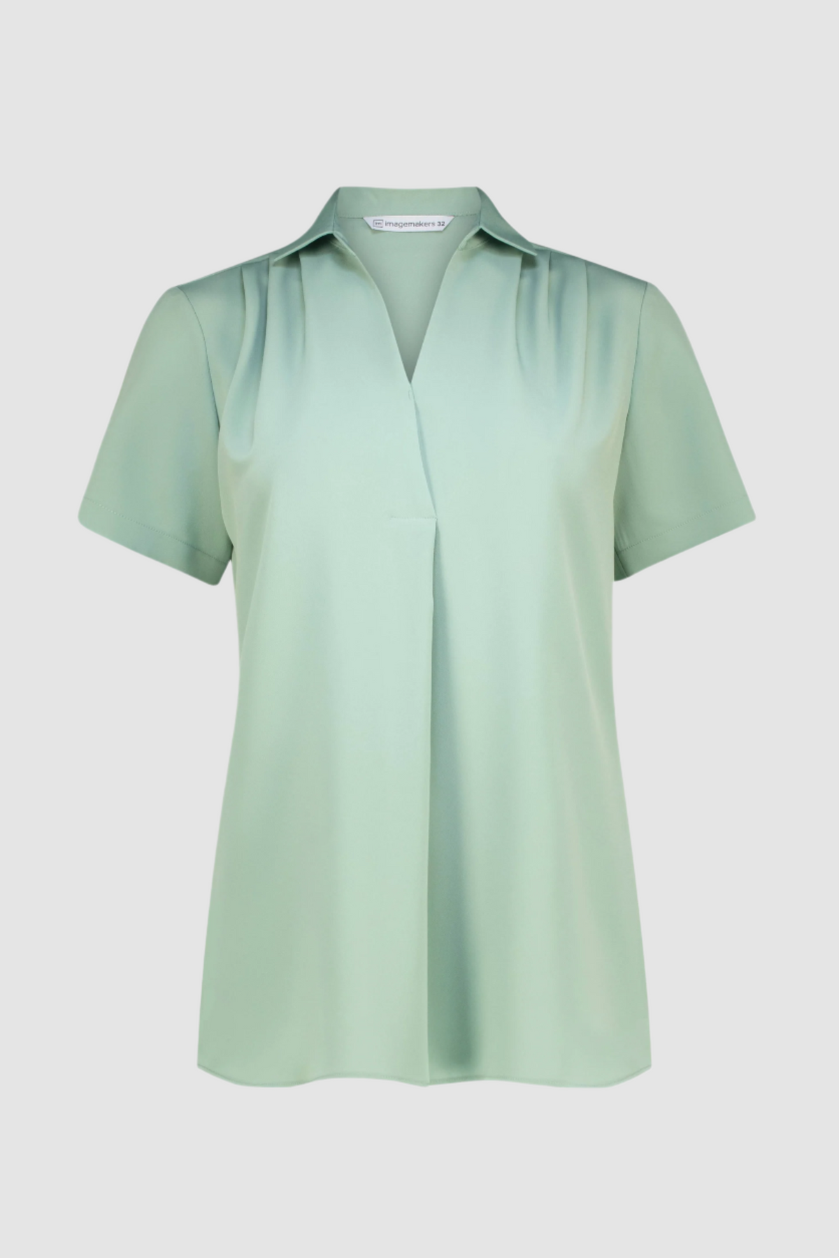 A Sage Green, V-neck Work Top with Short Sleeves  and a relaxed fit sold by ImNow. 