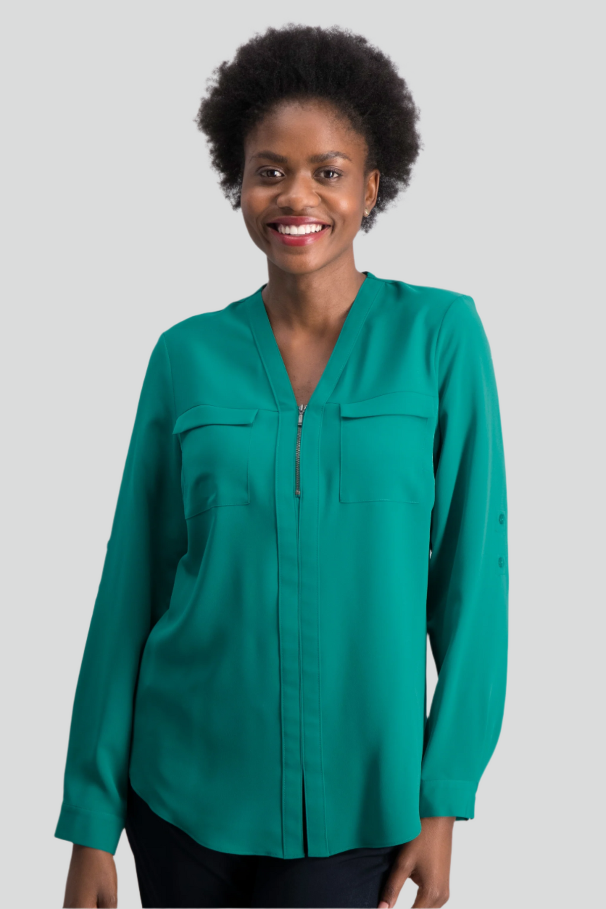 Womens relaxed fit green blouse with v-neckline with zip front and pocket detail  stocked by ImNow.  