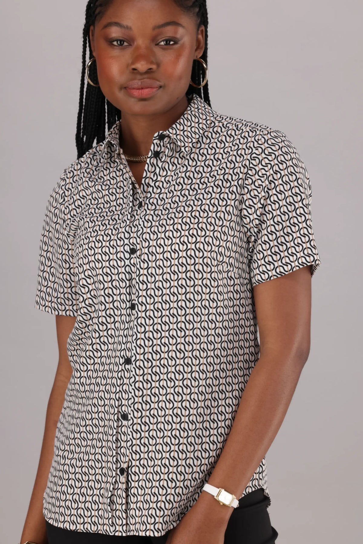 Women’s Office ready Short Sleeve Shirt by ImNow with Collar and Pintuck Button design in a Black and Neutral Print.