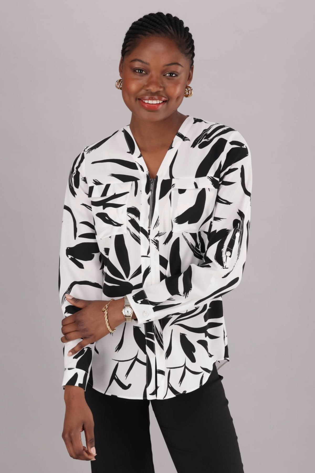 ImNow's Abstract Black Printed, Zipped Front, Womens Work Blouse with a Tab on the sleeve for adjustment. 