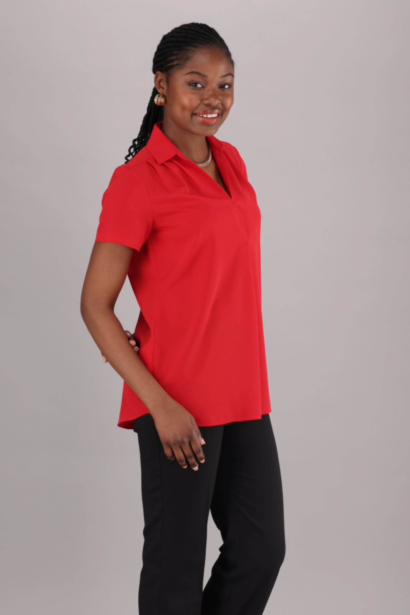Women’s Smart Shirt with a relaxed fit. it has a V-neckline, collar with short sleeves Avaialble on ImNow. 