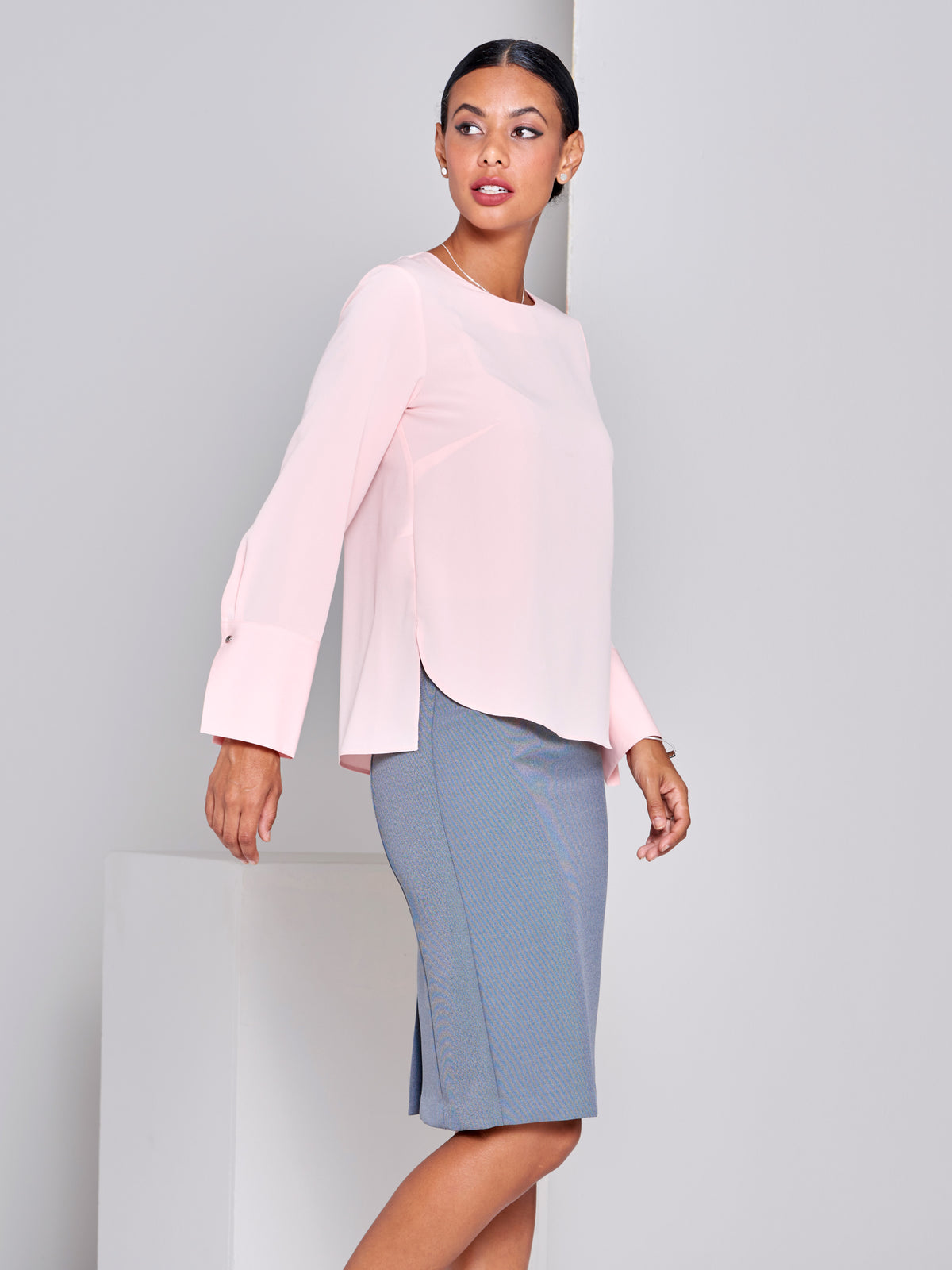 Classic women’s long sleeve round neck top for corporate wardrobe in light pink